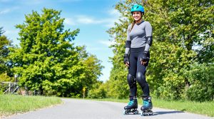 Ready to Roll? Your Ultimate Guide to Starting Inline Skating (and Loving It!) 1 young lady wearing full rollerblading protective equipment